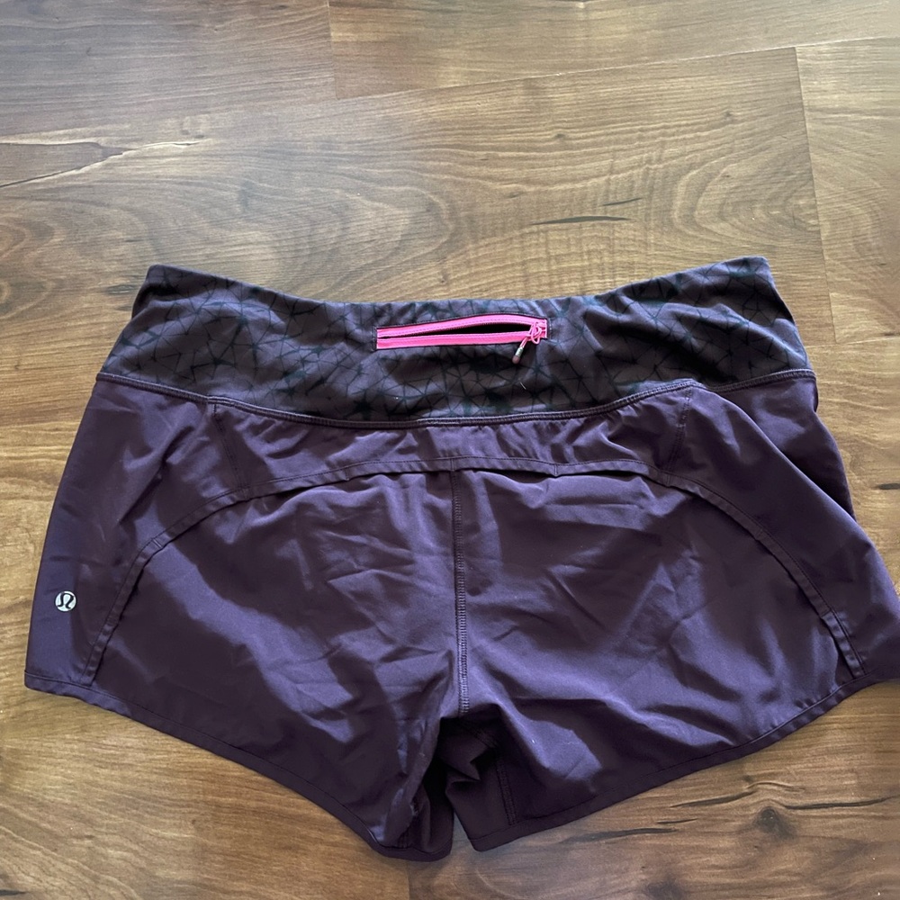 Maroon size 10 athletic shorts.